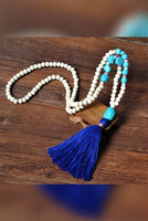 PORTS:  BOHEMIAN TASSEL NECK