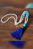PORTS:  BOHEMIAN TASSEL NECK
