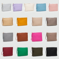 PORTS:  BRAIDED FAUX LEATHER CLUTCH