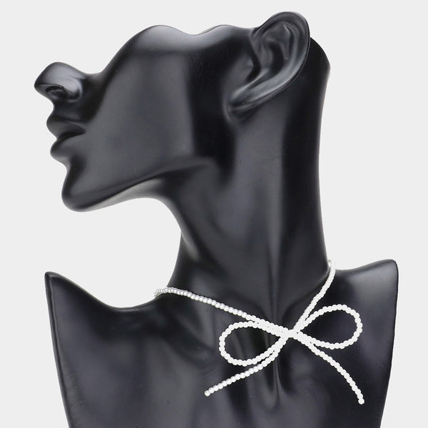 PORTS:  PEARL BOW CHOKER NECK