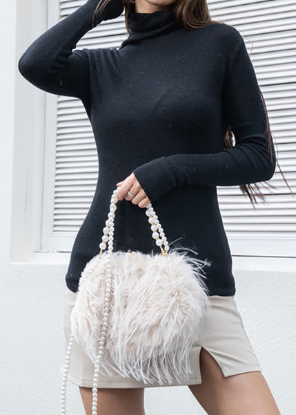 PORTS:  PEARL HANDLE FAUX FUR BAG