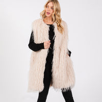 PORTS:  FAUX FUR POCKET VEST