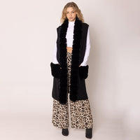 PORTS:  LONG FAUX FUR TRIM VEST/POCKETS