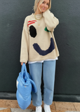MCCOLIN:  PLAYFUL FACE PULLOVER SWEATER
