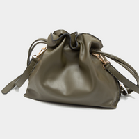 WEARING OF THE GREEN! BAGS!:  SOLID FAUX LEATHER BUCKET BAG