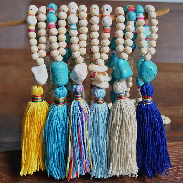 PORTS:  BOHEMIAN TASSEL NECK