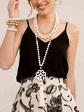 ZENZII:  NECK W/WAVE PENDANT/TASSEL